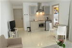 Frixos Hotel Apartments Living Room - Kitchen
