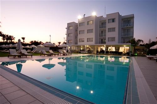 Frixos Suites Hotel Apartments Pool by night